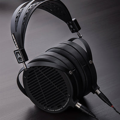 Black headphones on a desk