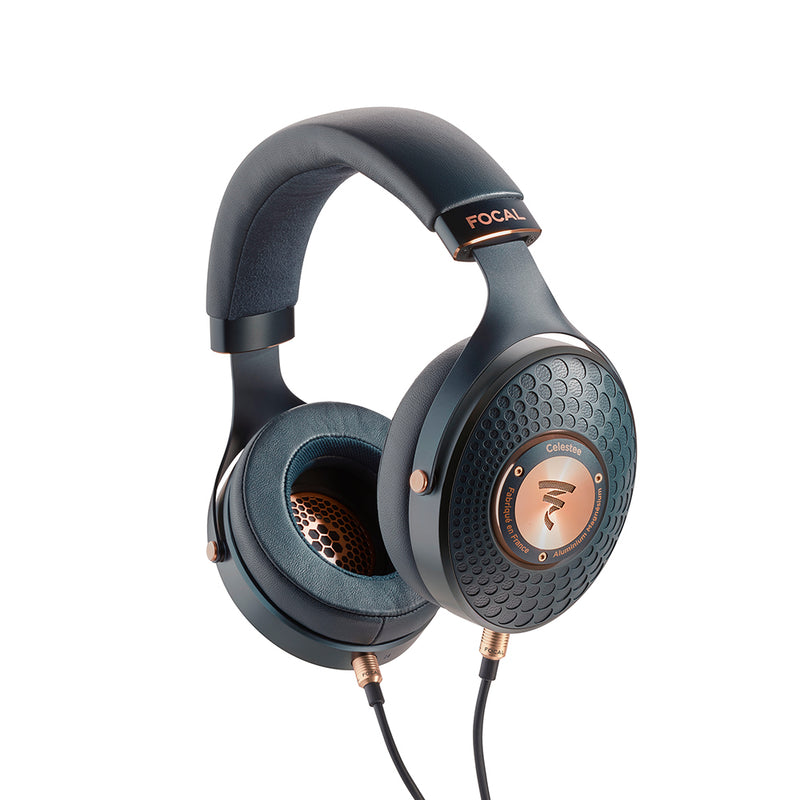 Dark blue headphones with copper accents and cables plugged in