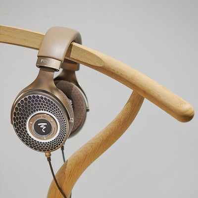Headphones on a wooden stand